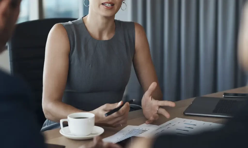 office meeting woman at desk