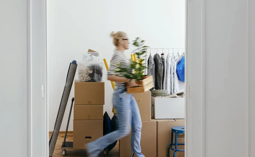 woman moving items